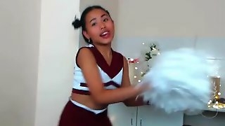 Young Cheerleader Asian....
